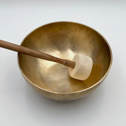 felt mallet and handmade tibetan singing bowl