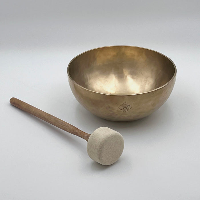 wool felt mallet and root chakra tibetan singing bowl